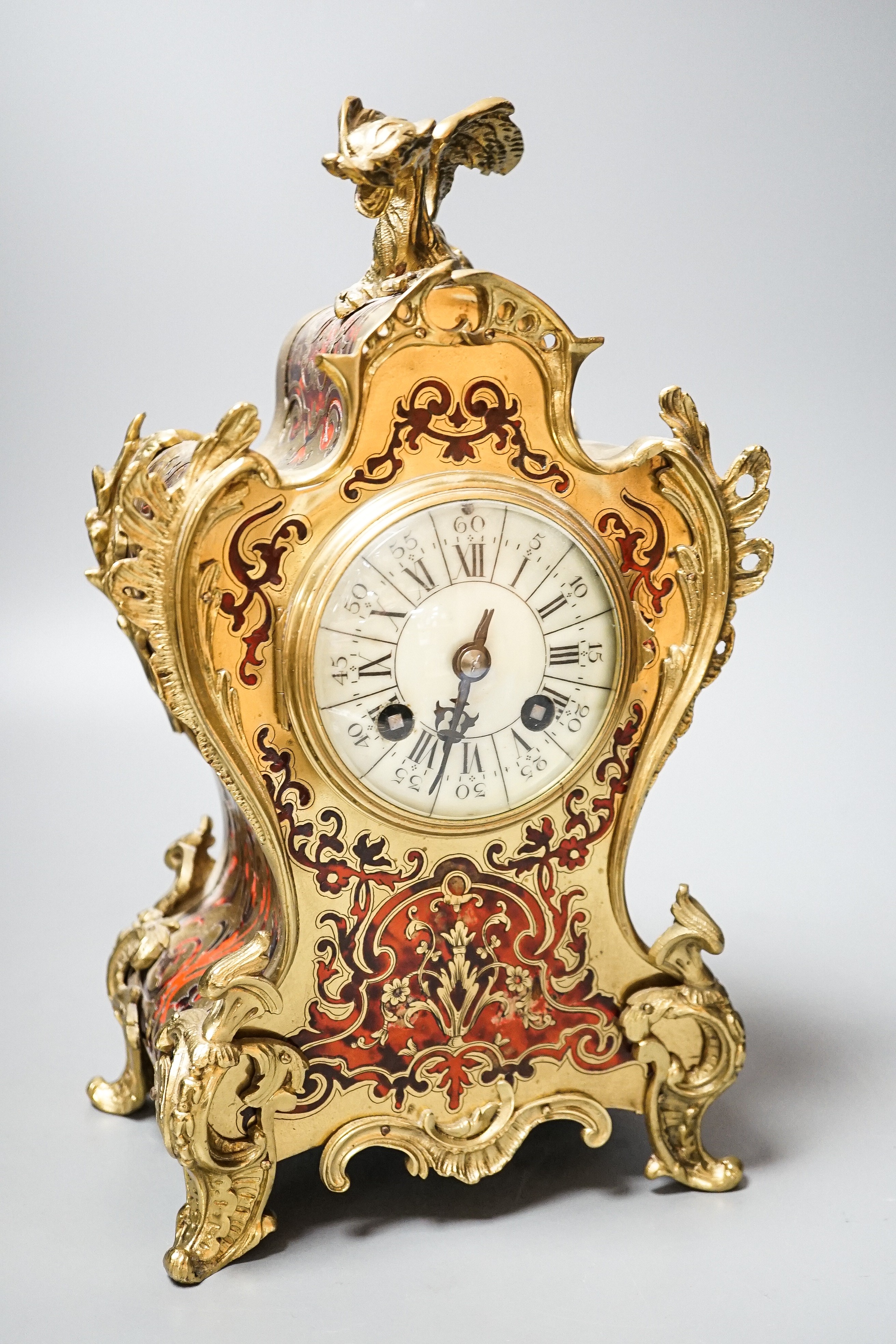 A 19th century French scarlet boulle work 8 day mantel clock 30cm